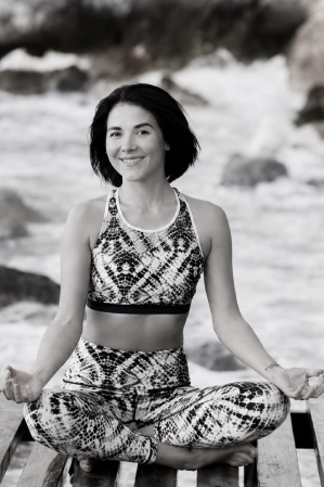 Portrait of Elena, STOTT PILATES certified instructor and experienced yoga teacher.